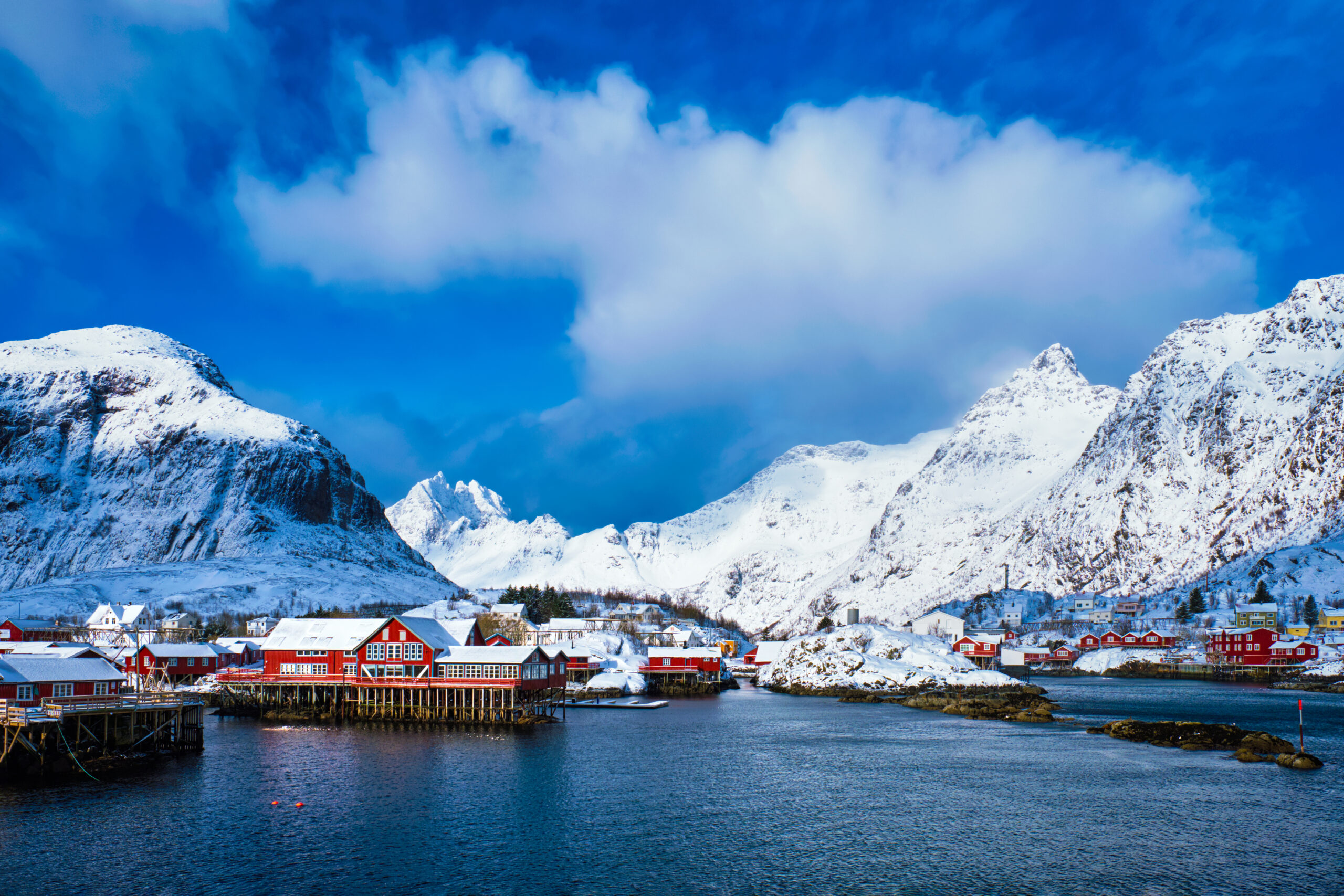 Traditional fishing village A on Lofoten Islands, Norway with red rorbu houses. With snow in winter